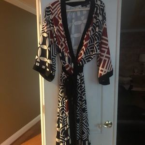 Eloquii kimono style wrap midi dress in deep red, black and off white.